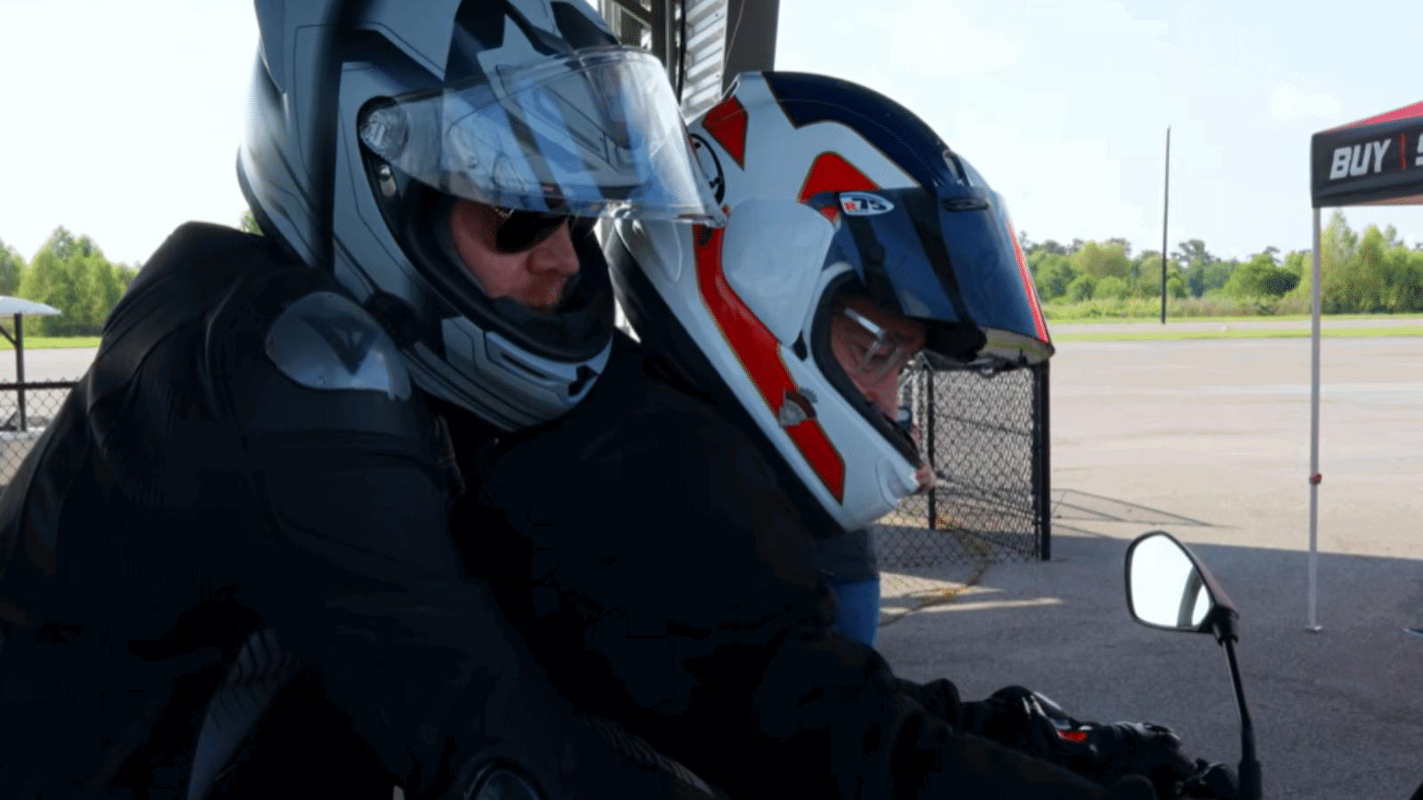 Bill Burr riding passenger with Freddie Spencer. 