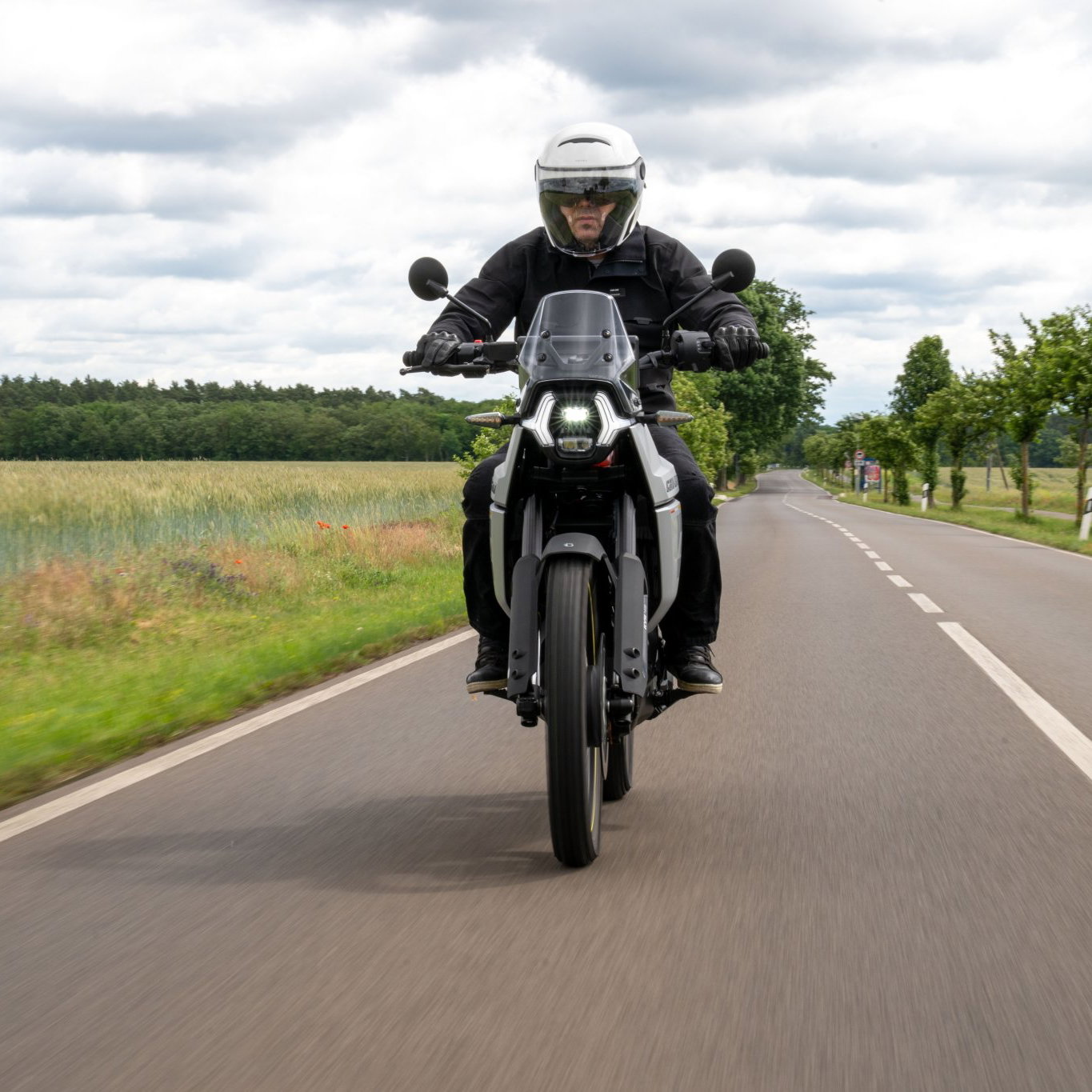 Can-Am Origin motorcycle on the road.