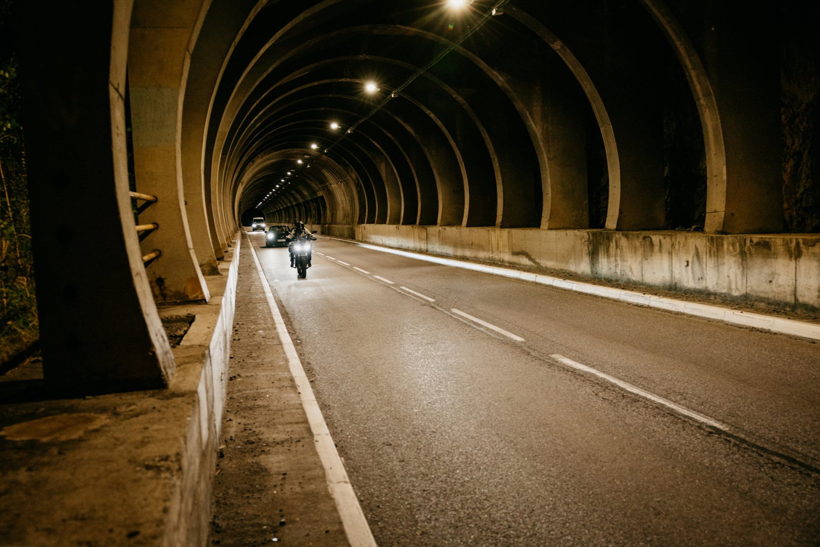 Zero DS motorcycle riding through a tunnel.