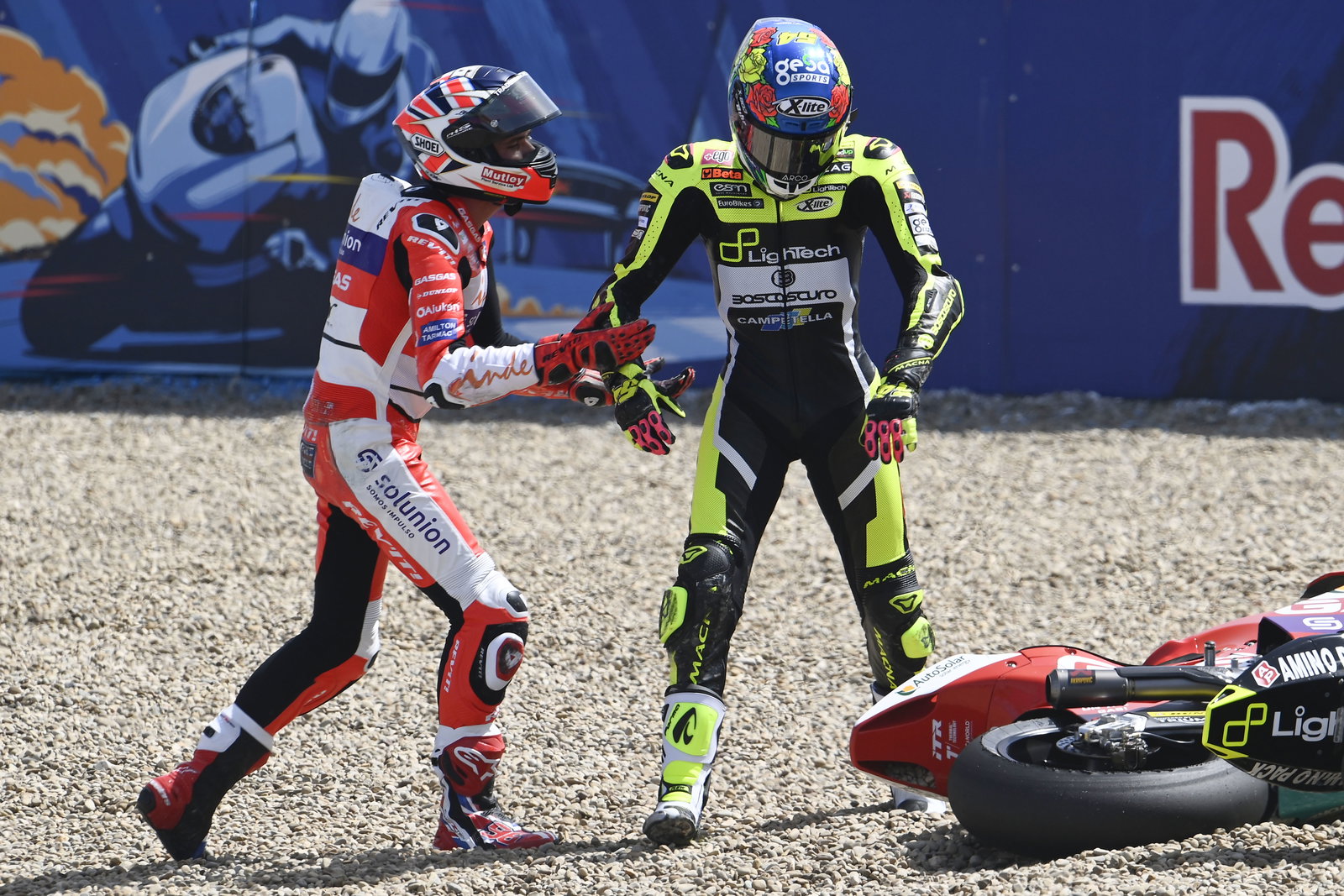 Jake Dixon and Fermin Aldeguer in Jerez T13 gravel trap, 2022 Spanish Moto2 Grand Prix. - Gold and Goose.