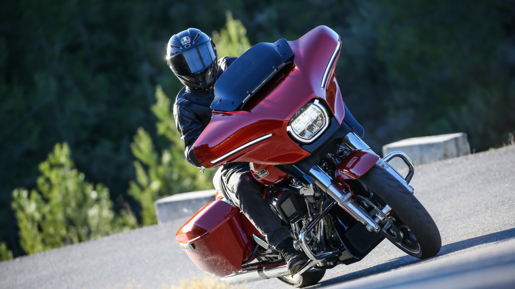 A Harley-Davidson riding along a road