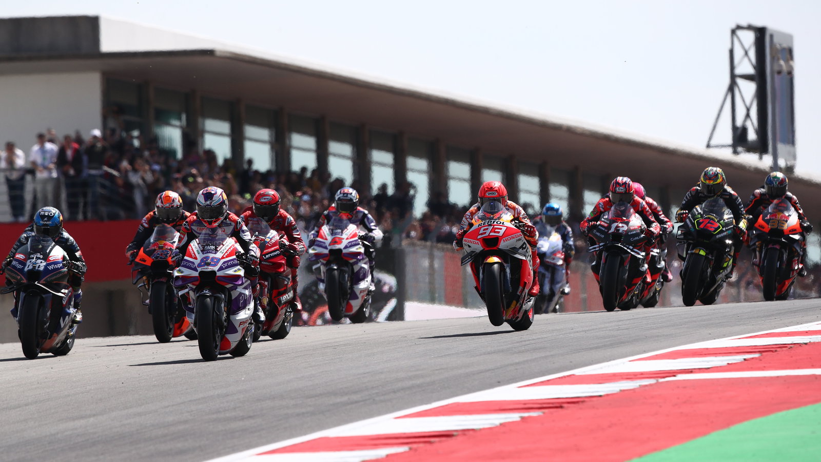 MotoGP race start, 2023 MotoGP Portuguese Grand Prix. - Gold and Goose