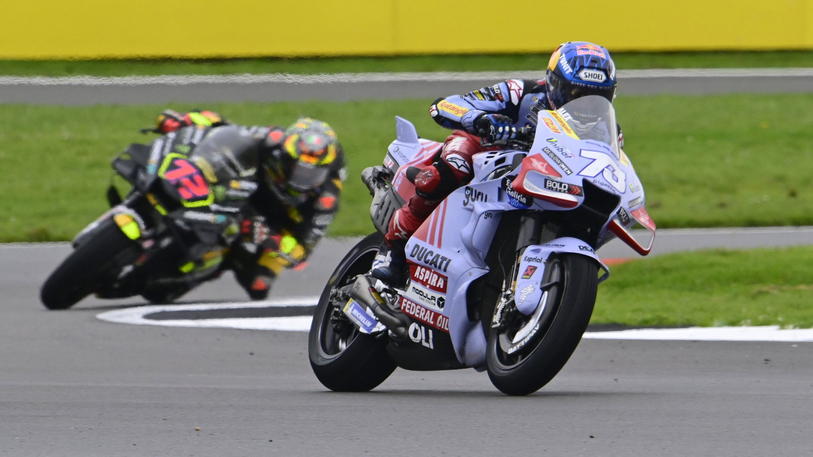 Alex Marquez leads Marco Bezzecchi, 2023 MotoGP British Grand Prix. - Gold and Goose
