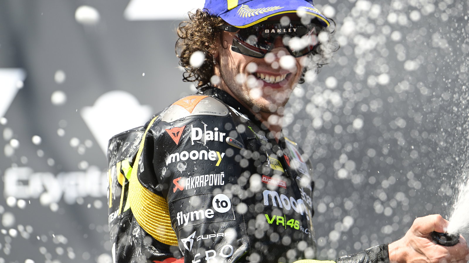 Marco Bezzecchi, 2023 MotoGP Austrian Grand Prix podium. - Gold and Goose