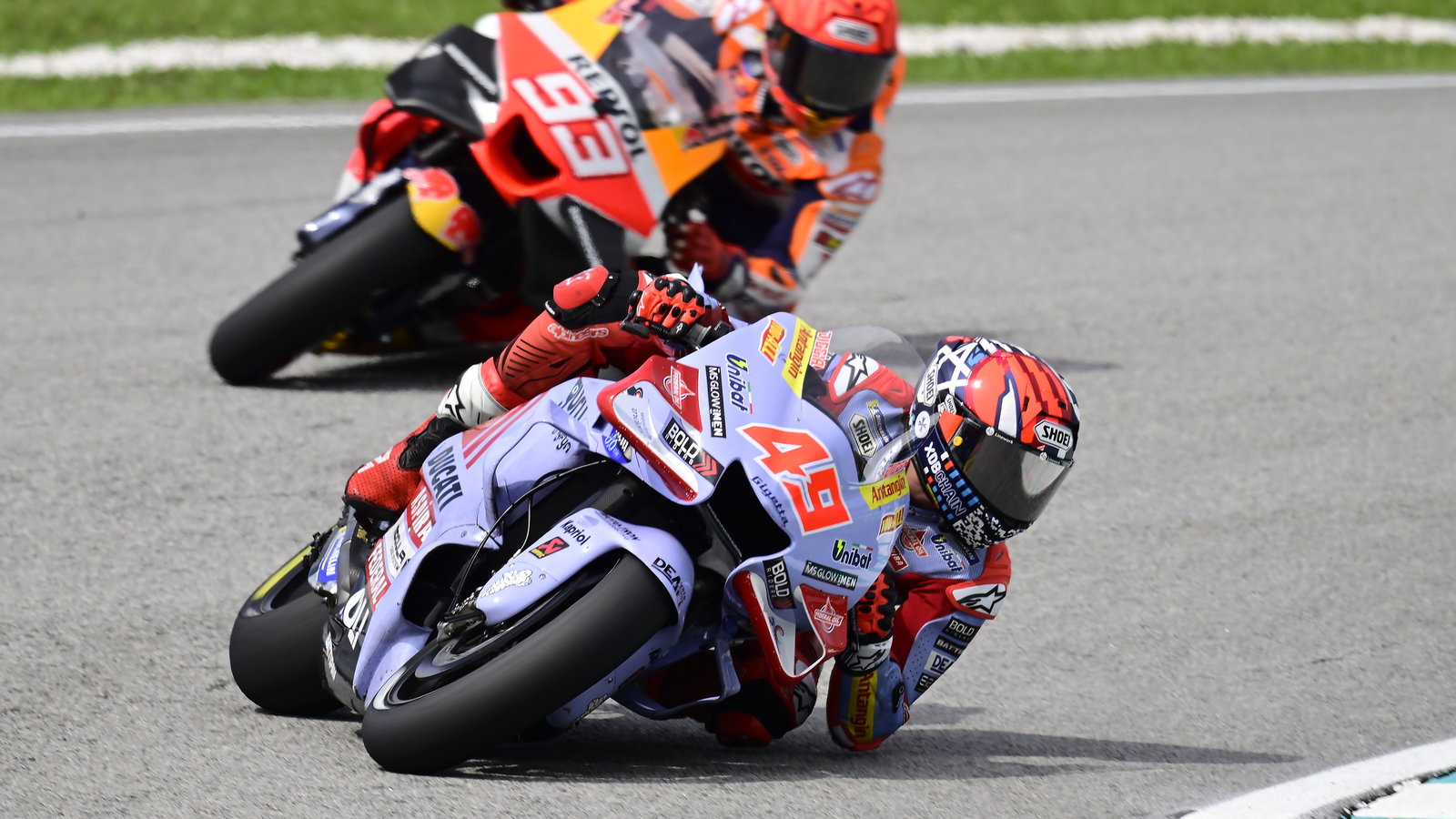 Fabio Di Giannantonio, Marc Marquez, 2023 MotoGP Malaysian Grand Prix. - Gold and Goose