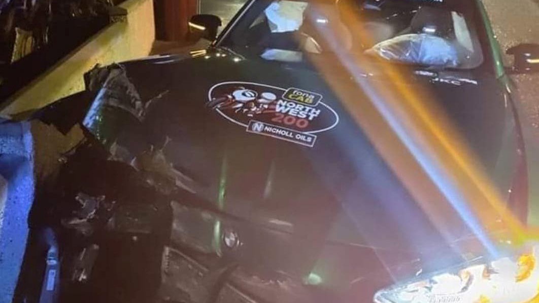 Green BMW M3 Competition crashed into garden wall. - Causeway Coast Community