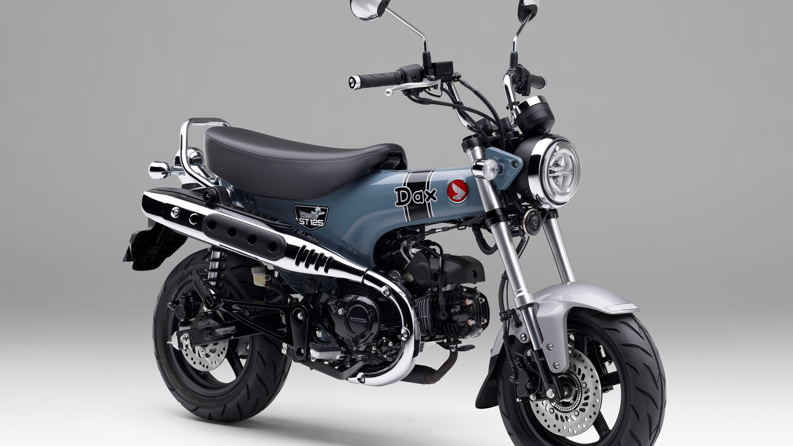 Honda ST125 Dax my2023, grey.