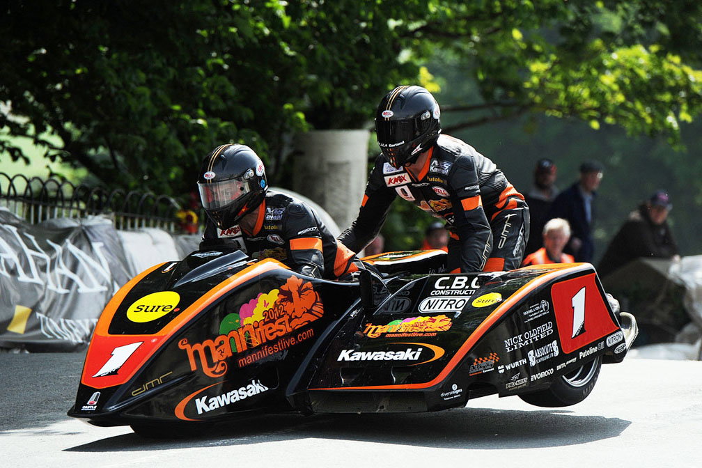 Rutter sets first electric 100mph TT lap