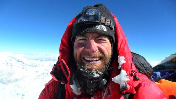 Daredevil biker jumps between roof ledges on £100m mansion