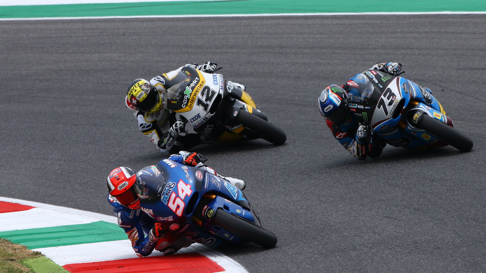 Mattia Pasini leads Alex Marquez and Tom Luthi at 2017 Italian Grand Prix. - Gold and Goose
