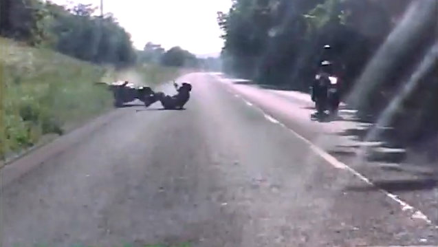 Police footage shows wheelie crash from rider and driver's view