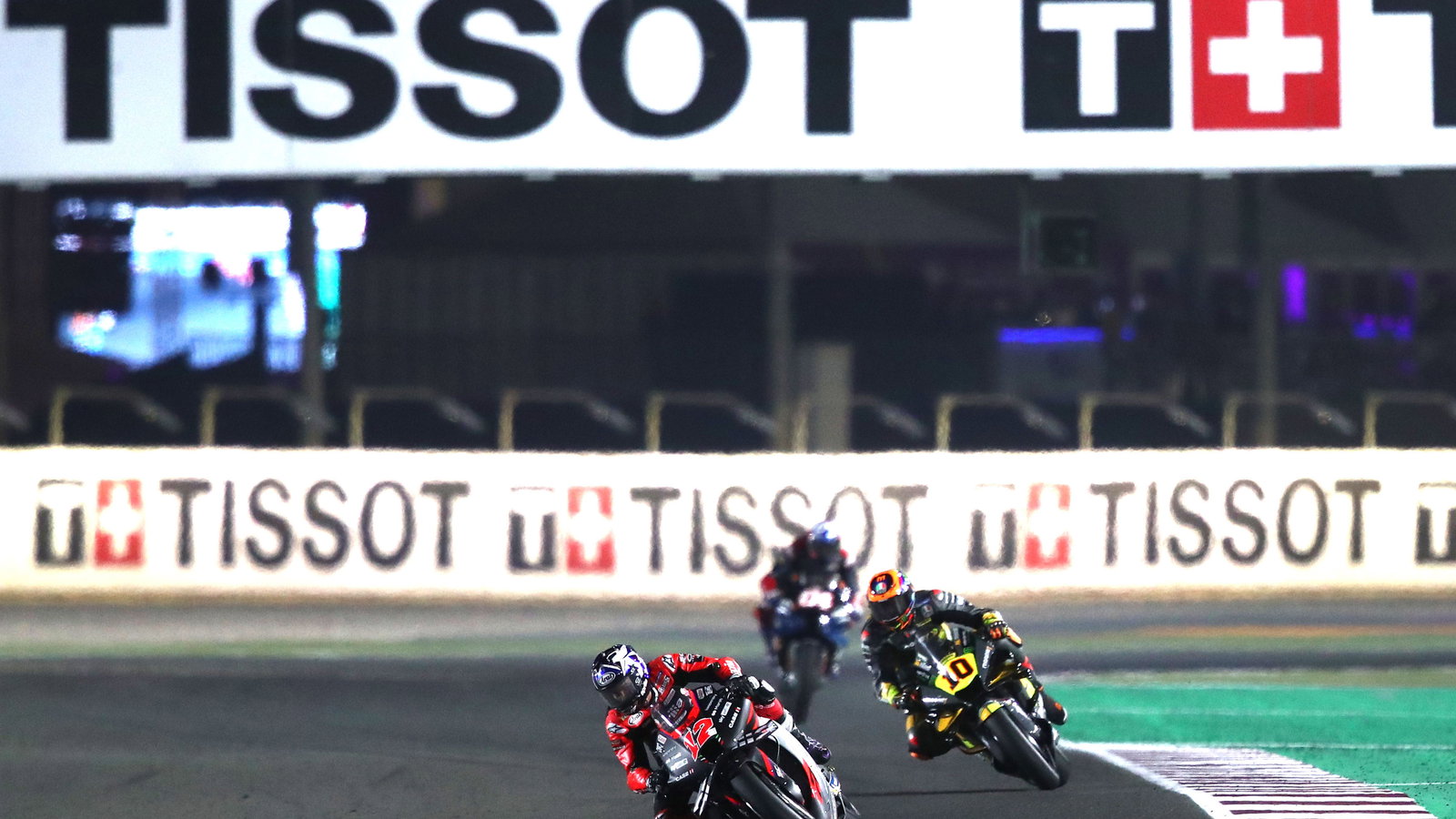 Maverick Vinales leads Luca Marini and Andrea Dovizioso in 2022 Qatar Grand Prix. - Gold and Goose