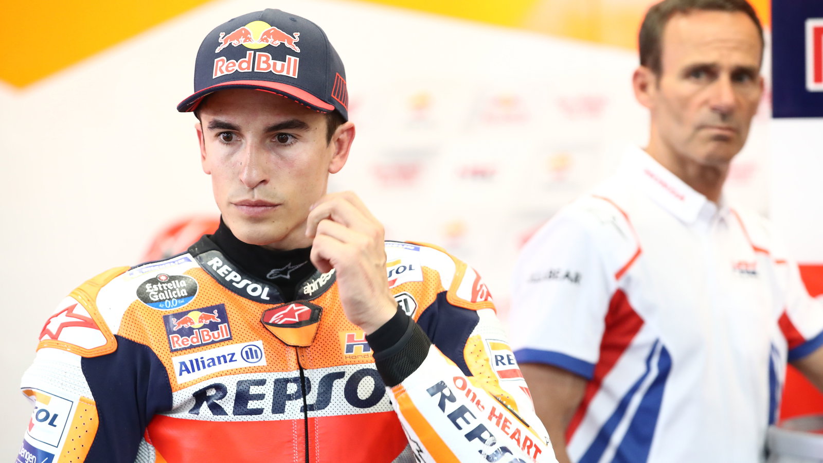 Alberto Puig looks at Marc Marquez in Repsol Honda garage, 2022 Italian Grand Prix. - Gold and Goose