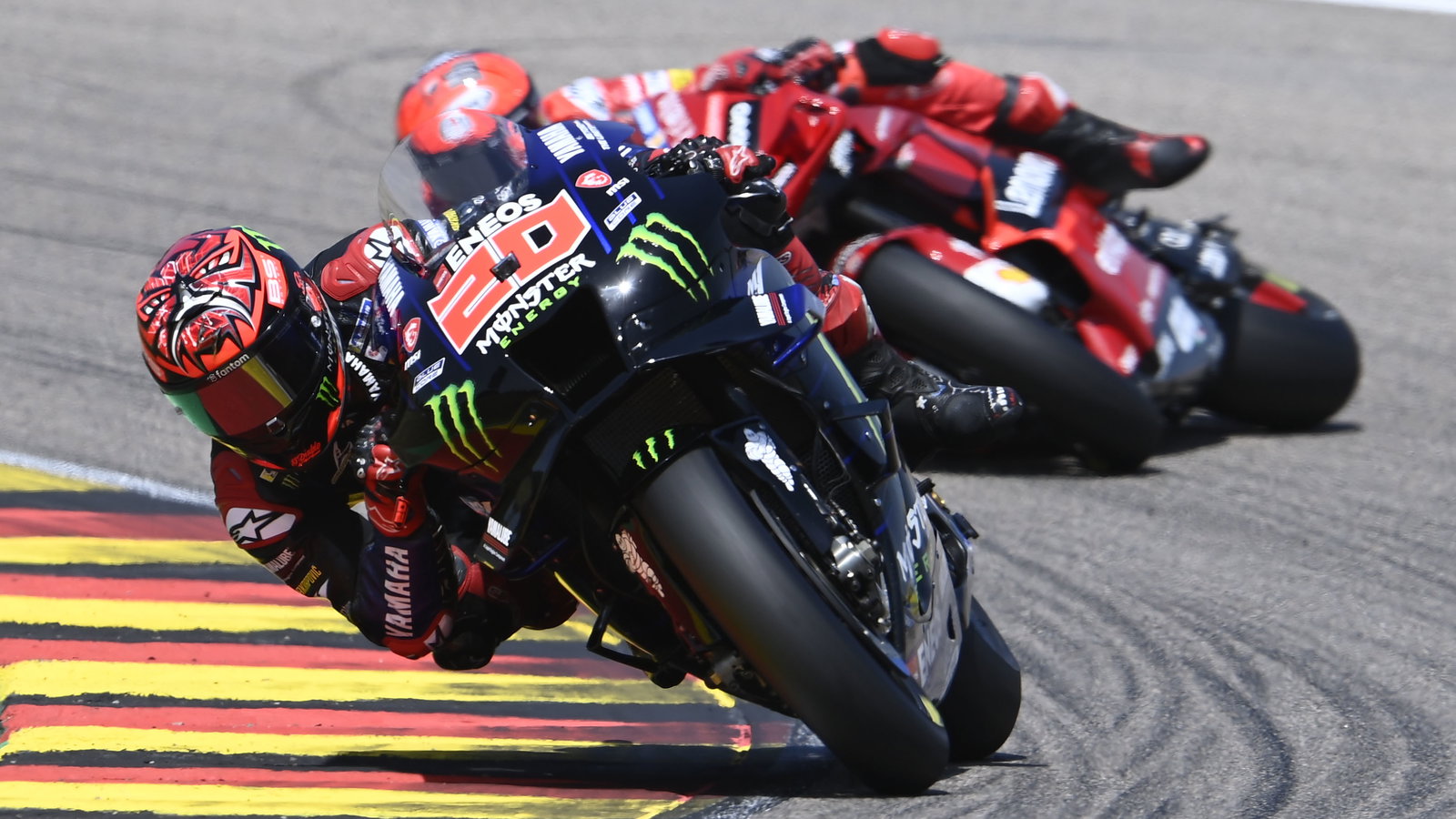 Francesco Bagnaia crashes out behind Fabio Quartararo, 2022 German Grand Prix. - Gold and Goose