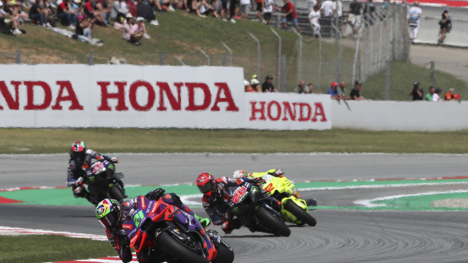 Franco Morbidelli leads Fabio Quartararo, 2024 MotoGP Catalan Grand Prix. - Gold and Goose