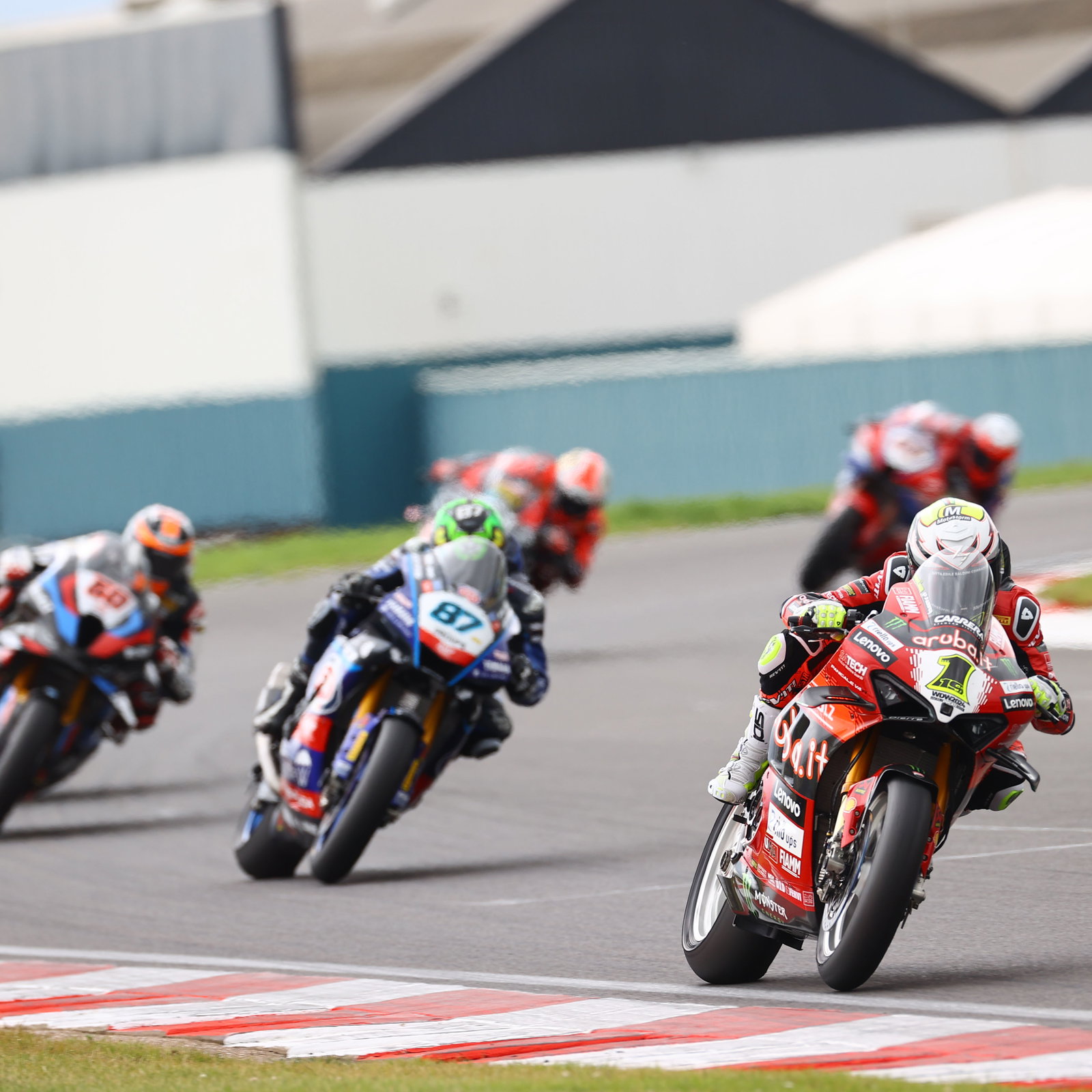 Alvaro Bautista leads Remy Gardner, 2024 UK WorldSBK. - Gold and Goose