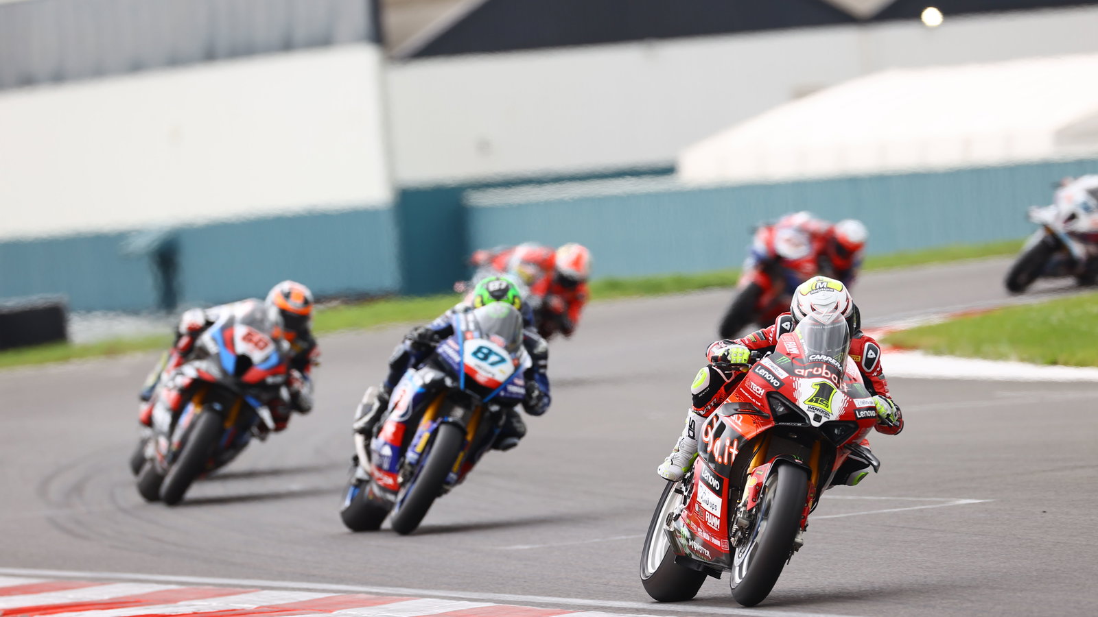 Alvaro Bautista leads Remy Gardner, 2024 UK WorldSBK. - Gold and Goose
