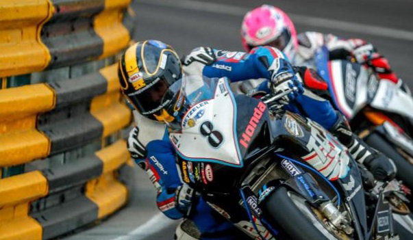 WATCH: Motorcyclist saves police officers from shocking assault