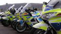 Police biker died after hitting bump in road