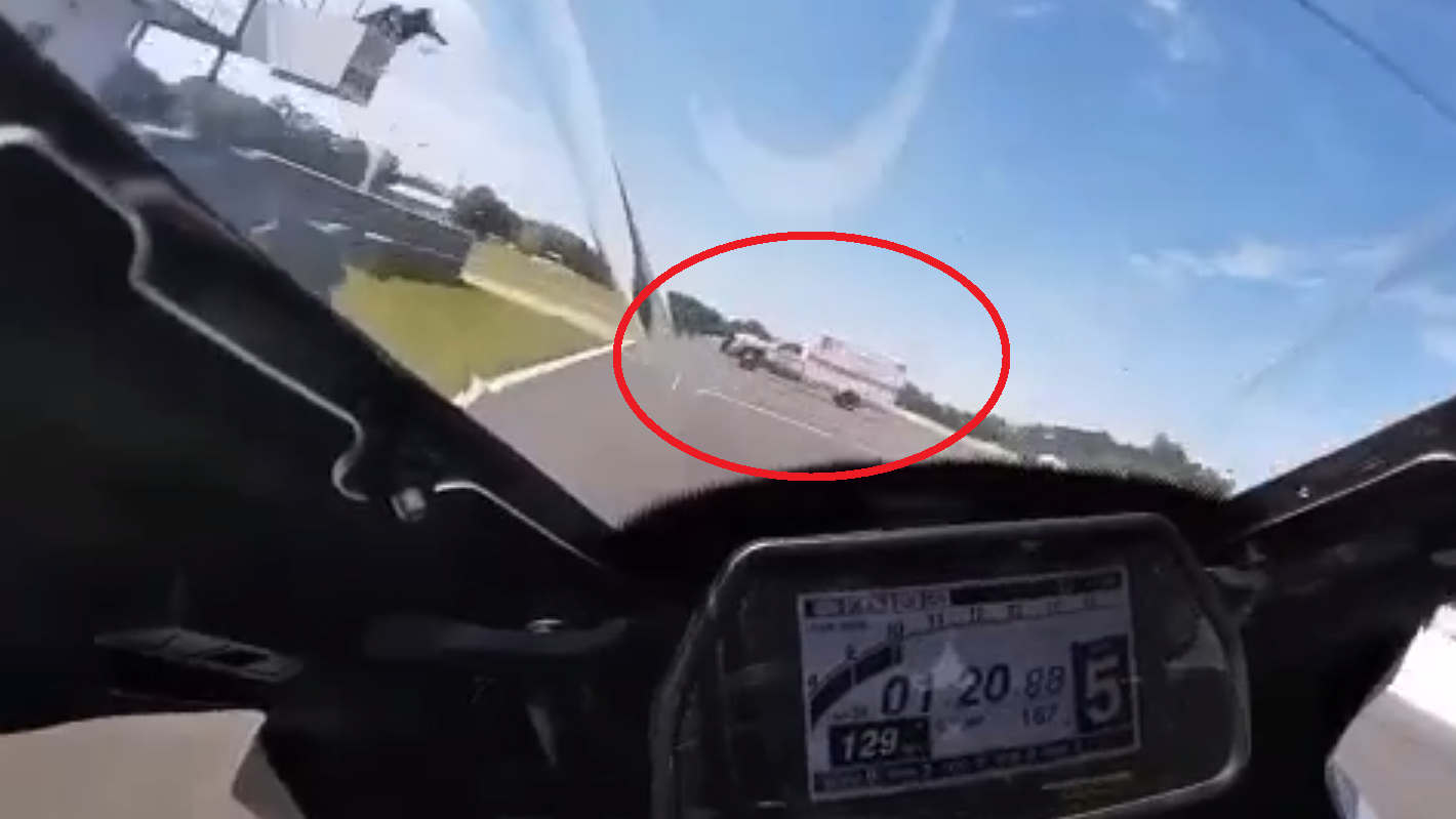 Ambulance pulls in front of motorcycle at Roebling Road Raceway