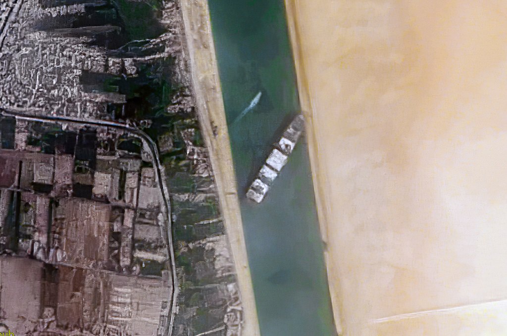 By Contains modified Copernicus Sentinel data [2021], processed by Pierre Markuse - Container Ship 'Ever Given' stuck in the Suez Canal, Egypt - March 24th, 2021, CC BY 2.0, 