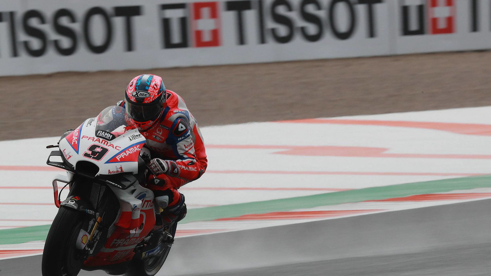Petrucci skates clear of Marquez in soaking wet FP2
