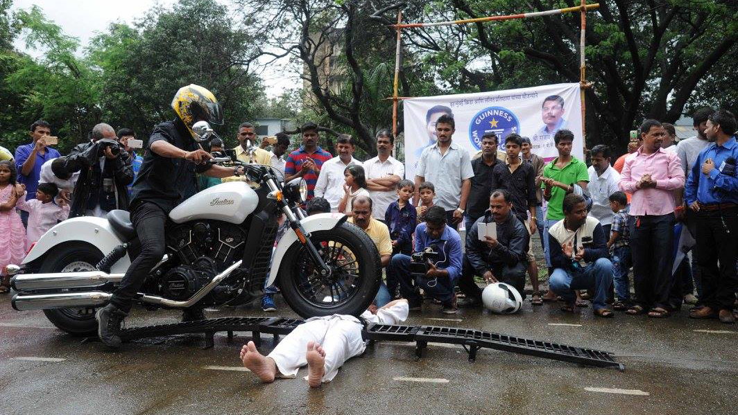 Guinness World Records most motorcycles to run over a person