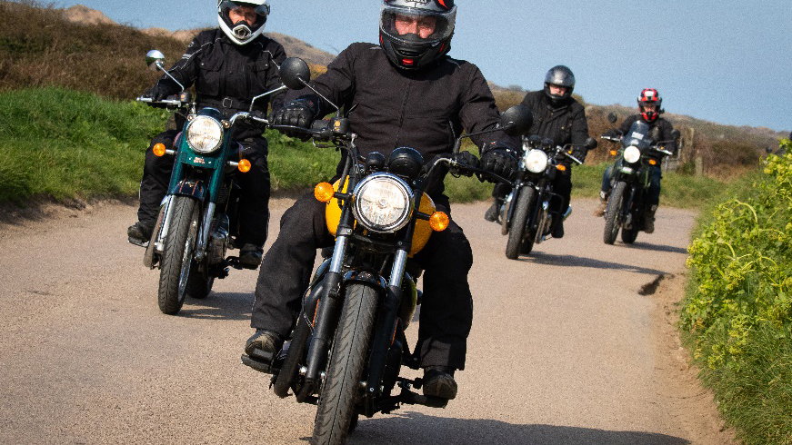 Royal Enfield bikes riding in mini-convoy.